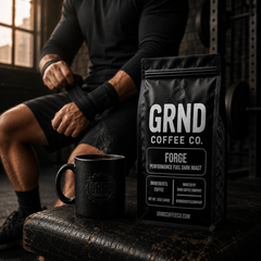 GRND FORGE dark roast coffee on a strength training bench